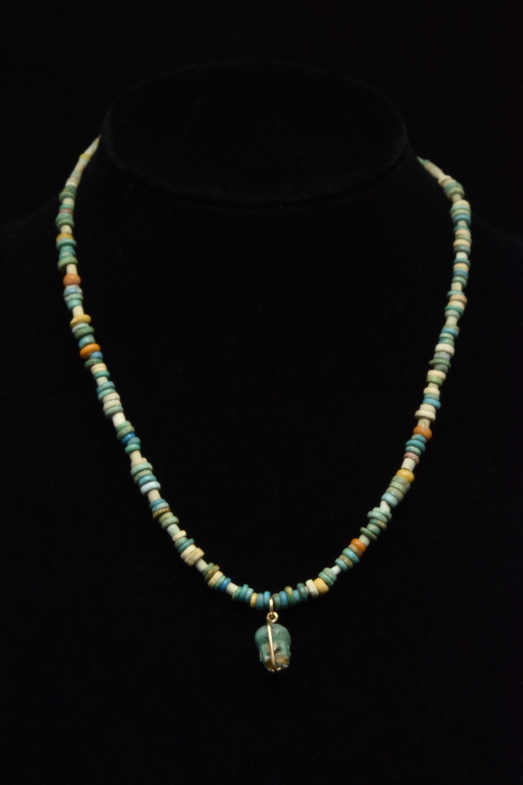 EGYPTIAN FAIENCE BEADED NECKLACE WITH PATAIKOS AMULET