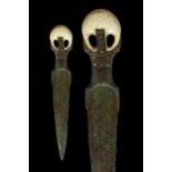 AN EGYPTIAN BRONZE DAGGER WITH HIPPOPOTAMUS TOOTH POMMEL - WITH REPORT
