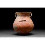 WESTERN ASIATIC TERRACOTTA TWIN HANDLED JAR