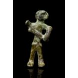 WESTERN ASIATIC BRONZE FIGURINE OF A FERTILITY GODDESS