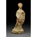 GREEK BOETIAN TERRACOTTA TANAGRA OF A DRAPED WOMAN