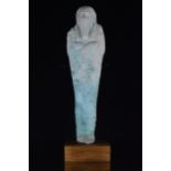 AN ANCIENT EGYPTIAN FAIENCE SHABTI