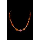 WESTERN ASIATIC CARNELIAN AND AGATE NECKLACE