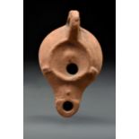 ROMAN TERRACOTTA OIL LAMP WITH HANDLE