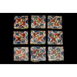 OTTOMAN GROUP OF NINE POLYCHROME IZNIK TILES WITH LOTUS BLOSSOMS