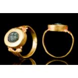 ROMAN GOLD EMERALD INTAGLIO RING WITH LION, MOON AND STAR