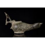 EARLY BYZANTINE BRONZE OIL LAMP WITH A CROSS