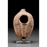 ROMAN TERRACOTTA OIL LAMP WITH DECORATION