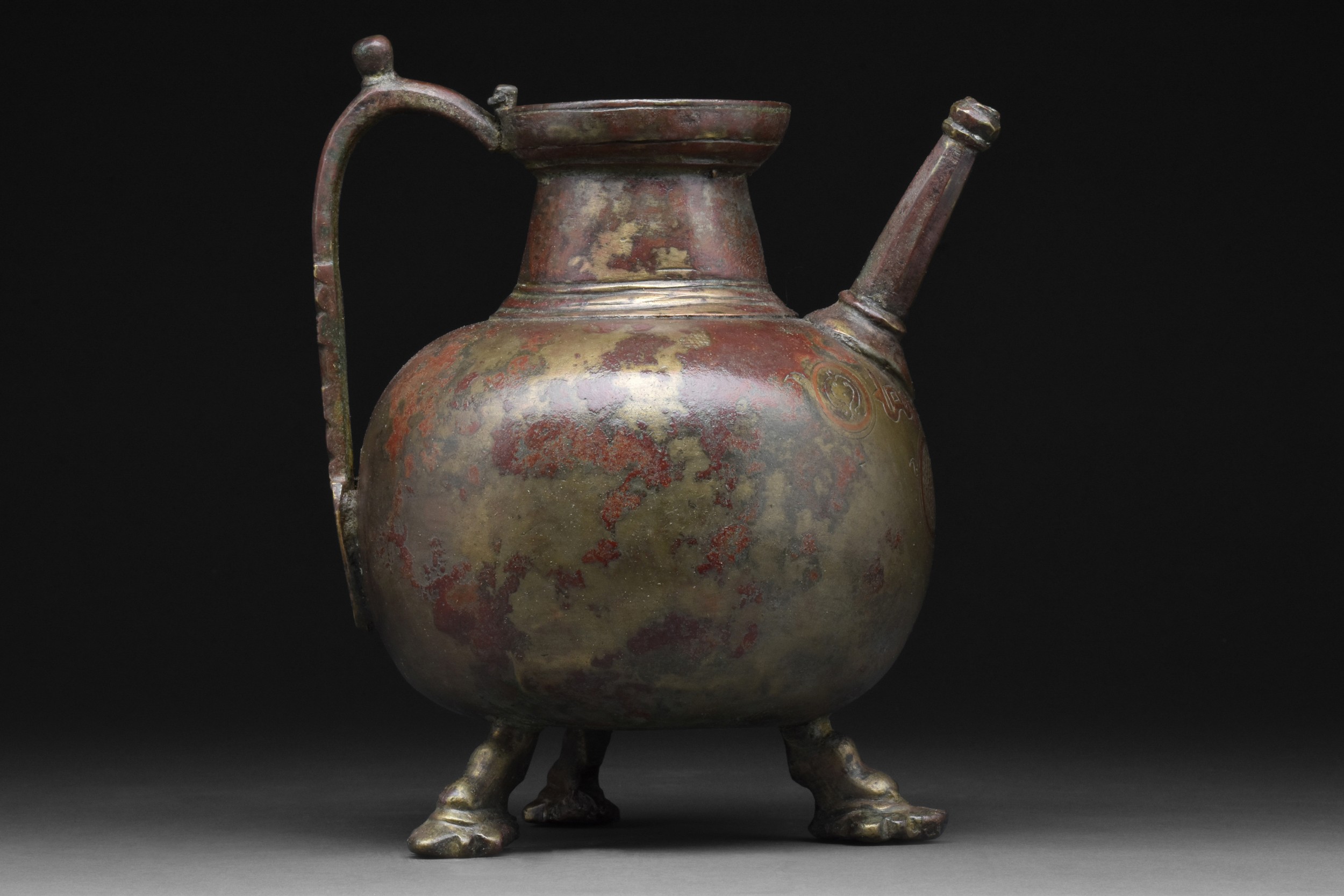 SELJUK COPPER BRASS TRIPOD JUG WITH CALLIGRAPHY