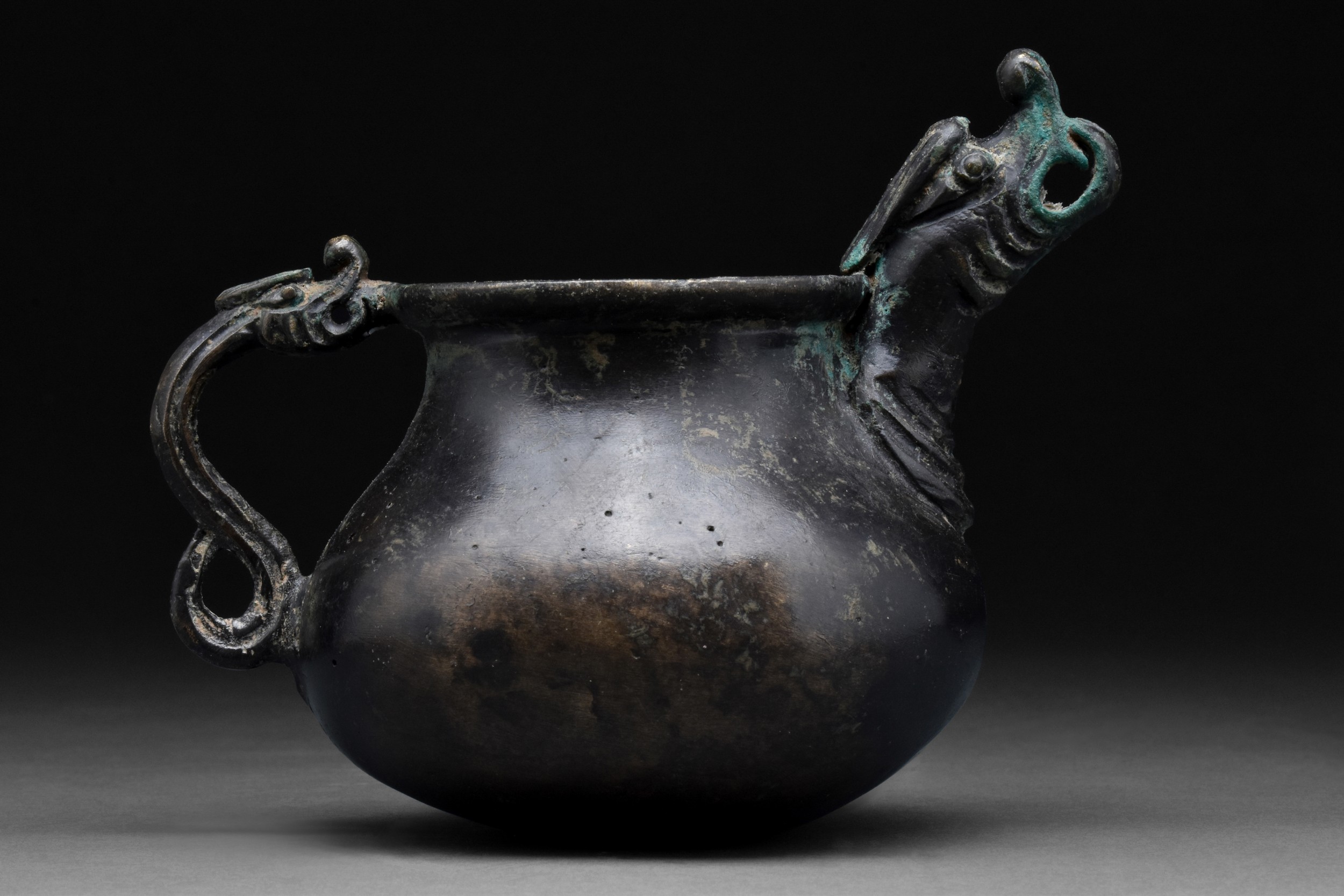 SAFAVID BLACK POTTERY JUG WITH DRAGON-HEADED HANDLE AND SPOUT