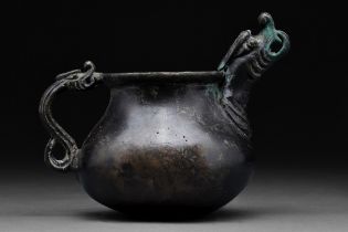 SAFAVID BLACK POTTERY JUG WITH DRAGON-HEADED HANDLE AND SPOUT