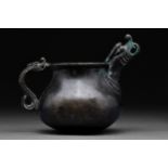 SAFAVID BLACK POTTERY JUG WITH DRAGON-HEADED HANDLE AND SPOUT