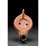 ROMAN TERRACOTTA OIL LAMP WITH FISH