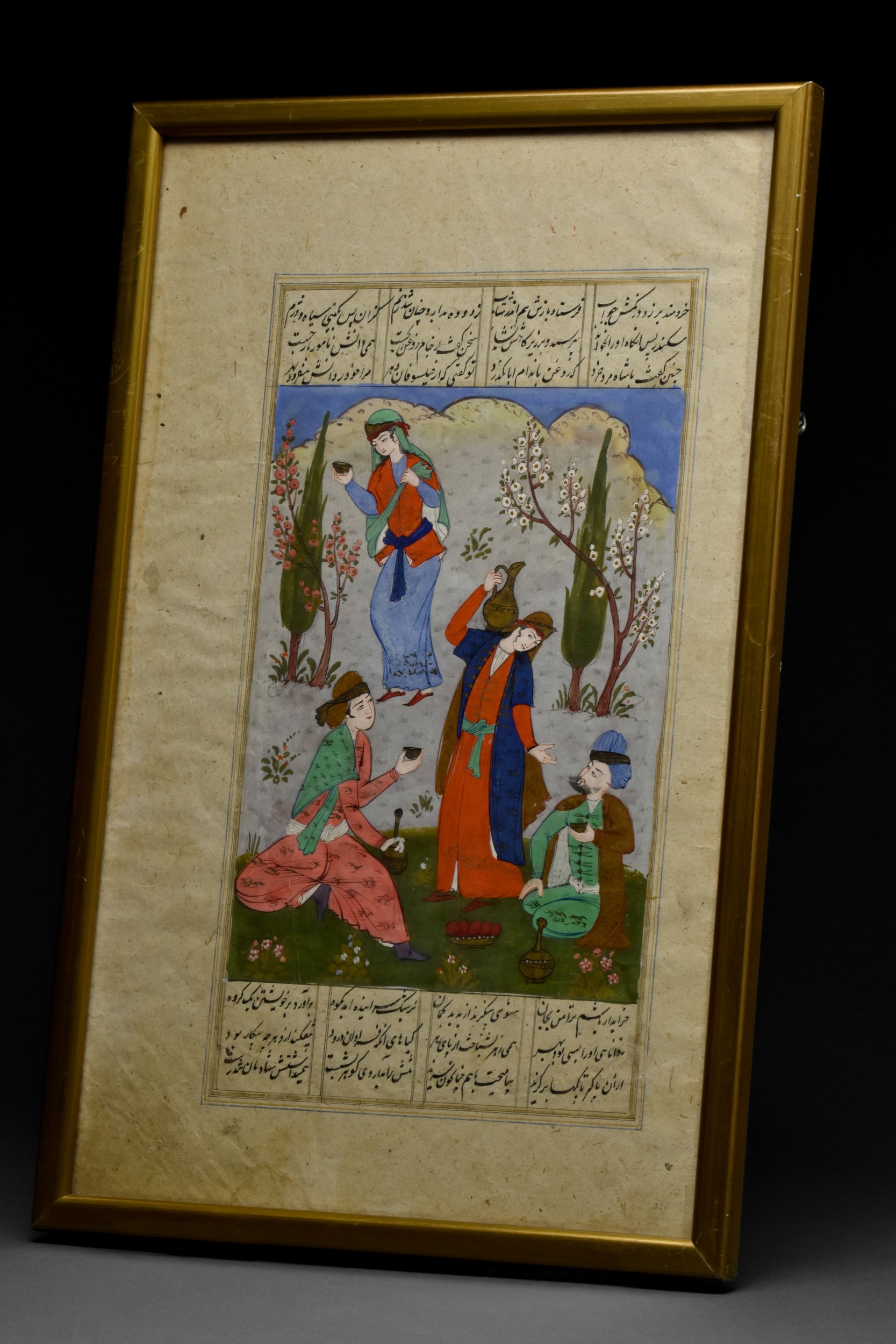 LATE SAFAVID OR QAJAR MANUSCRIPT PAGE WITH WOMEN SERVING DRINKS TO TWO MEN - Image 2 of 5