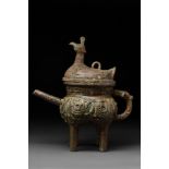 CHINESE ARCHAIC BRONZE POURING VESSEL WITH A BIRD-SHAPED LID