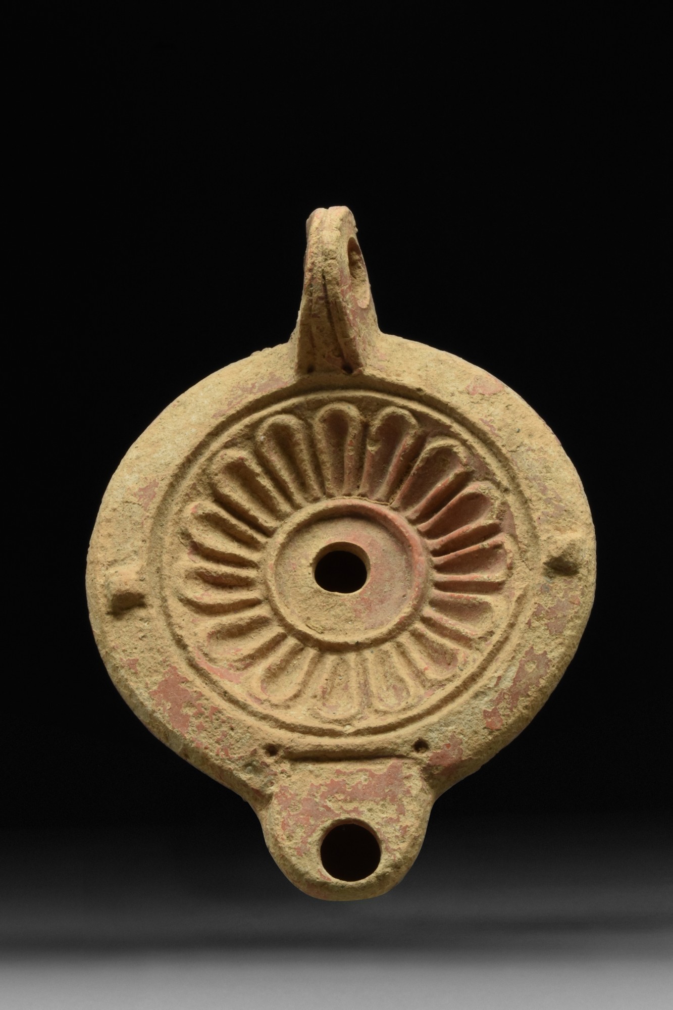 ROMAN TERRACOTTA OIL LAMP WITH ROSETTE AND MAKER'S MARK