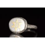 MEDIEVAL SILVER RING WITH GOLD INLAID STAR AND CROSS