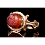 ROMAN GOLD RING WITH GOATER MILKING GOAT INTAGLIO