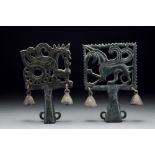 A PAIR OF SCYTHIAN BRONZE CHARIOT TERMINALS WITH GRIFFIN