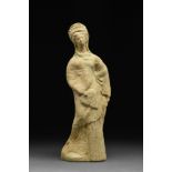 GREEK BOETIAN TERRACOTTA TANAGRA OF A DRAPED WOMAN