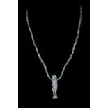 EGYPTIAN FAIENCE THOTH AS BABOON AMULET ON BEADED NECKLACE