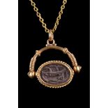 SWIVEL GOLD PENDANT WITH EGYPTIAN SCARAB