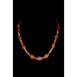 WESTERN ASIATIC CARNELIAN AND AGATE NECKLACE