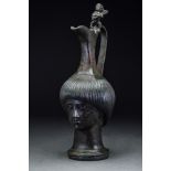 ROMAN FIGURAL BRONZE JUG WITH MALE HEAD