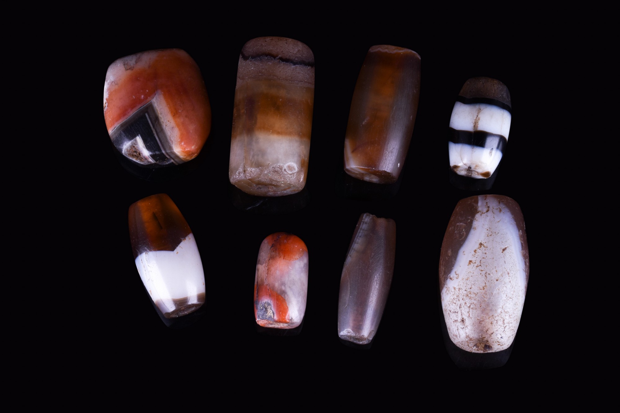 COLLECTION OF BACTRIAN AGATE STONE BEADS
