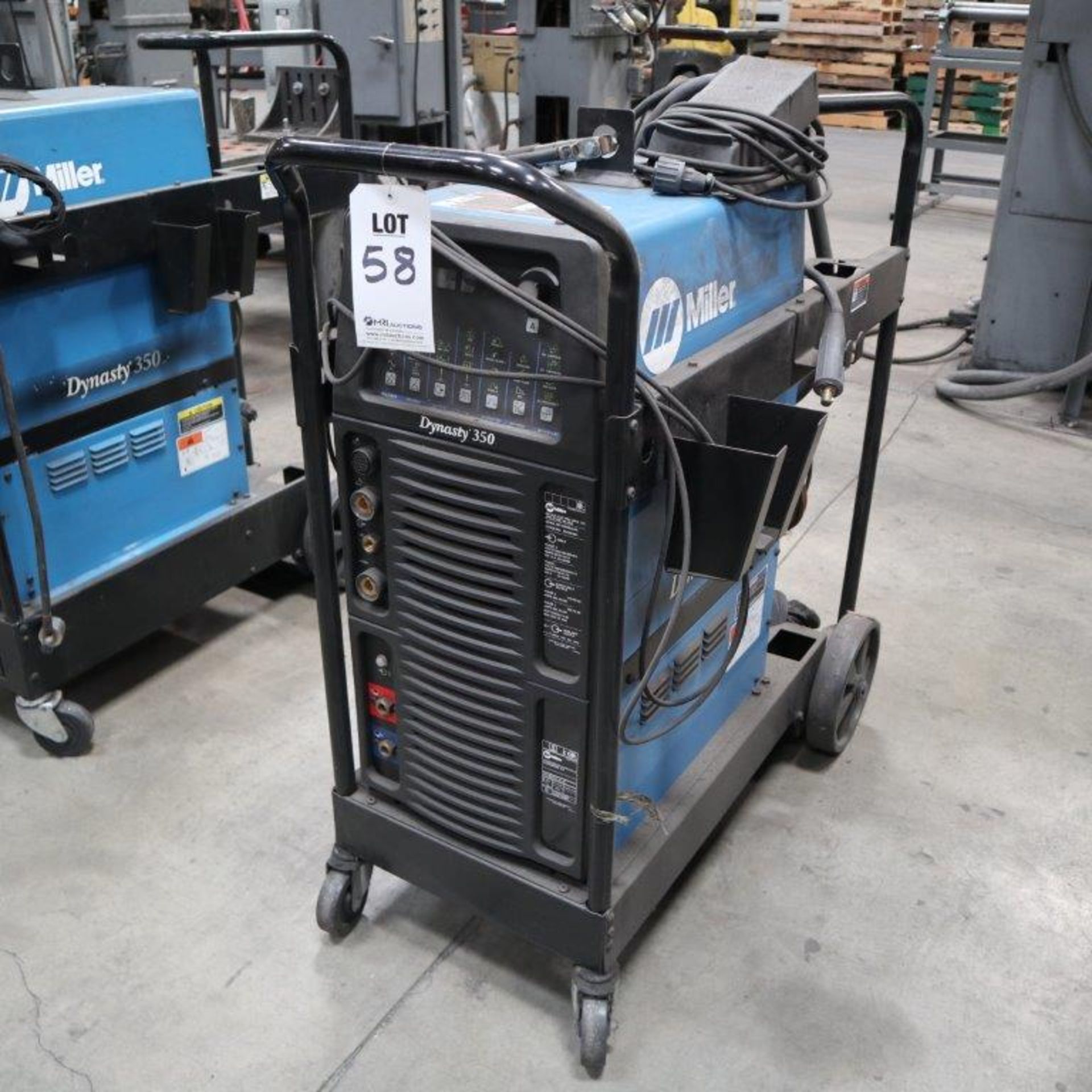 MILLER DYNASTY 350 AC/DC TIG AND STICK WELDER, WATER COOLED, WITH ROLLING CART WITH CABLES, S/N