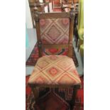 Victorian oak Gothic design side chair with padded back and stuff over seat on turned and faceted