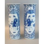 Pair of Late Qing Chinese porcelain blue and white cylinder vases, each decorated with painted