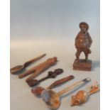 Collection of treen to include; cawl spoons, Scandinavian carved nut cracker, modern love spoon,