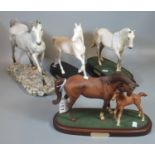 Three Royal Doulton china studies of horses, First Born and Spirit of the Wind, together with a