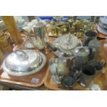 Two trays of metalware to include a pair of silver plated entree dishes, toast rack, pweter