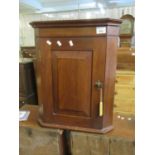 Small mahogany hanging corner cupboard with blind raised and fielded panelled door. (B.P. 21% + VAT)