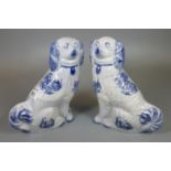 Pair of flow blue Staffordshire blue and white transfer printed fireside dogs. (2) (B.P. 21% + VAT)