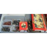 Two trays of Britains and other metal model painted lead soldiers, some in original boxes and some