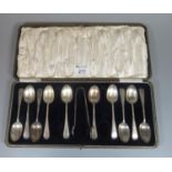 Cased set of 10 silver spoons with sugar nips (two spoons missing), Sheffield hallmarks. 5.8oz troy.