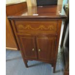 Edwardian inlaid gramophone cabinet lacking mechanism, the hinged top over two blind panelled doors.