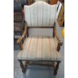 20th Century open armed damask upholstered mahogany side chair with fluted baluster front legs. (B.