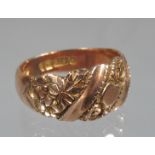 9ct rose gold ring engraved with flowers and foliage. Ring size O. Approx weight 4.9 grams. (B.P.