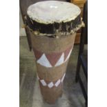 South African carved and polychrome decorated free standing cylindrical tribal drum with skin