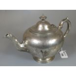 19th Century silver baluster teapot having chased foliate decoration and ivory mounts to the handle.