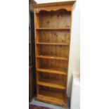 Modern natural pine open bookcase with six shelves under a moulded cornice. 77cm wide approx. (B.