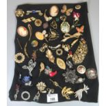 Collection of vintage brooches, cameo designs, butterflies, flowers, foliage, etc. (B.P. 21% + VAT)
