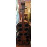 Novelty ten section wine rack in the form of a double bass in burr walnut finish. (B.P. 21% + VAT)