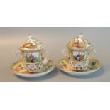 Pair of continental chocolate cups, saucers and covers decorated with courting couples, flowers