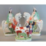 Three 19th Century pottery flat backed figurine; two of Scotsmen in kilts sitting side saddle on