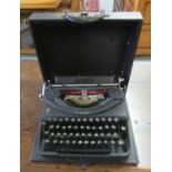 An Oliver vintage manual typewriter in case. (B.P. 21% + VAT)